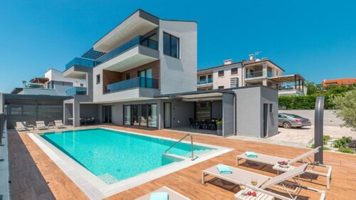 Bild 2 - 4 Zimmer Einfamilienhaus zum Kaufen in Faana