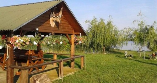 Bild 1 - Haus mit Fischweiher und 3.5 ha Land