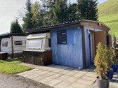 Bild 1 - Wohnwagen mit Holzanbau in St. Gallen