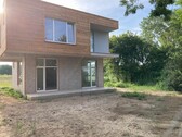 Bild 1 - 4 zweistockige Häuser direkt am Strand