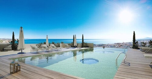 Bild 3 - 4 Zimmer Etagenwohnung in Benalmadena