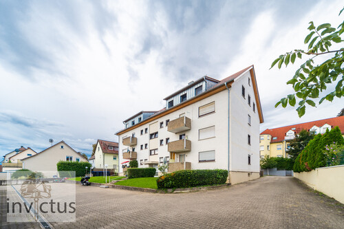 Rückansicht - Zentrale Lage, helle Räume, solider Grundriss – attraktive und freie 2-Zimmer-Wohnung in Böckingen.