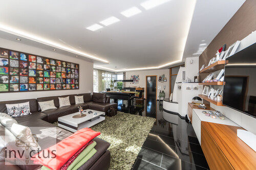 Wohnzimmer - 6.5 Zimmer Einfamilienhaus zum Kaufen in Langenbrettach