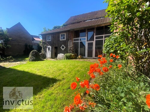 Garten / Innenhof - Vielseitiges Wohn- und Geschäftshaus mit Werkstatt und Ladenfläche in zentraler Lage