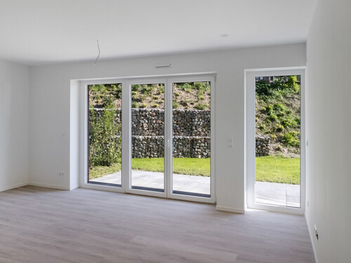 Wohn- und Esszimmer mit Terrassenzugang - Erdgeschoßwohnung mit 67,00 m² in Rieseby zum Kaufen
