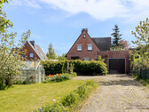 Gartenansicht mit zweiter Zufahrt zum Grundstück - 