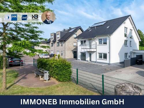 Titelbild - Neuwertiges Mehrfamilienhaus in Hamm-Heessen: 3 Einheiten, Gewerbefläche & privater Garten