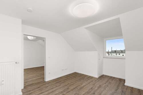 Wohnzimmer - Dachgeschoßwohnung mit 42,12 m² in München zur Miete