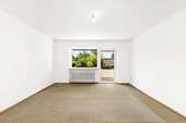 Wohnzimmer - Appartement mit 91,00 m² in Grafrath zum Kaufen