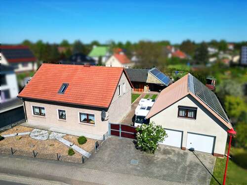 Vogelperspektive - Kapitalanleger: Vermietetes EFH in Cottbus Kiekebusch – Mieteinnahmen ab Tag 1 und Preis VB!