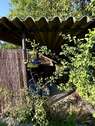 Versteckter Mülltonnenunterstand - 