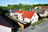 Schrägansicht EFH inkl. Nebengebäuden - Anlageobjekt mit 124,89 m&sup2; in Lohsa zum Kaufen