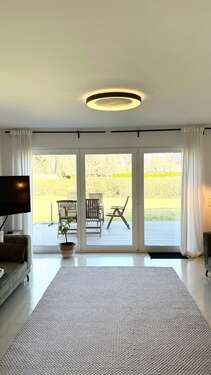 Wohnzimmer mit Terrassenzugang - Einfamilienhaus mit 136,21 m&sup2; in Cottbus zum Kaufen