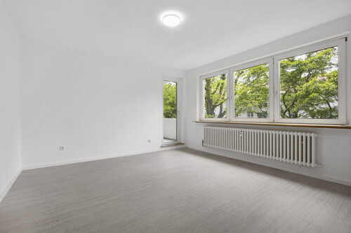 Wohnzimmer mit Balkon - 