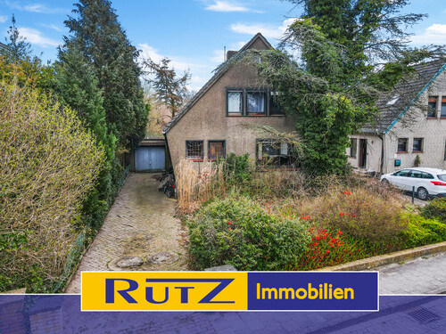Titelbild/Aussenansicht - Delmenhorst-Bungerhof Sanierungsbedürftiges Einfamilienhaus mit Garage und großzügigem Grundstück