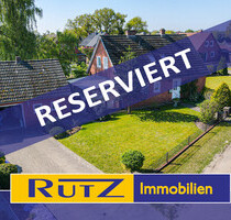 Ganderkesee-Heide Gepflegtes Siedlungshaus auf schönem Eckgrundstück mit Garage und viel Potential - Ganderkesee / Heide