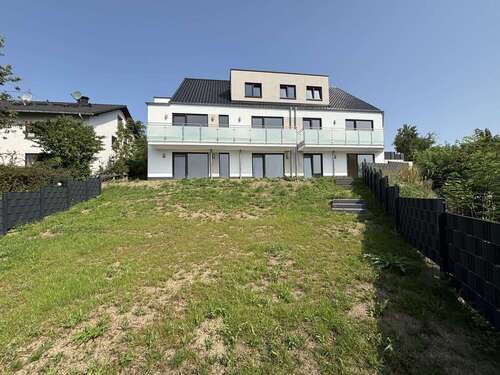 Hausansicht Gartenseite - 3- Zimmerwohnung mit 94,00 m² in Puderbach zum Kaufen