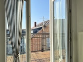 Aus der Küche zum Balkon sehend - Wohnen mit Weltkulturerbe: 2-Zimmer-Wohnung mit Balkon, Fahrstuhl & Ausblick