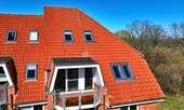 Der Sonnenbalkon - Wohnen wie im eigenen Haus: Lichtdurchflutete Maisonette mit USP und 180°-Schwerin-Panorama