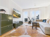 Frankfurt Kalbach Eigentumswohnung - Wohnzimmer - Vermietete 2-Zimmer-Wohnung mit Balkon und TG-Stellplatz in einem modernen Gebäude aus 2015