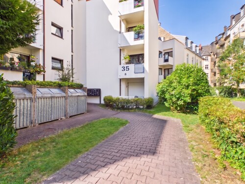 Außenansicht - Stilvolle 3-Zimmer-Eigentumswohnung in attraktiver Lage von Wiesbaden mit Loggia und TG-Stellplatz