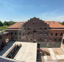 ATIK: Neubau mit Holzmassivdachstuhl im historischen Bahn-Betriebswerk Heidelberg