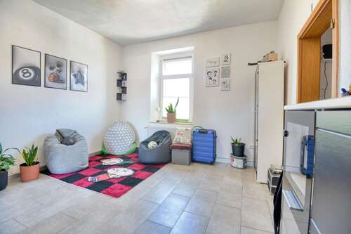 Wohnzimmer - Zweifamilienhaus mit 123,57 m&sup2; in Neustadt an der Weinstraße zum Kaufen