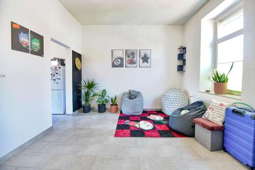 Wohnzimmer_Bild2 - 2FH mit Blick auf die Haardt mit Erweiterungspotential