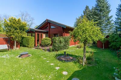 Foto - GEMÜTLICHES HOLZHAUS MIT GARTENPARADIES