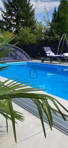 Foto - WOHNEN & VERMIETEN MIT GARTEN UND POOL