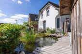 Foto - 11 Zimmer Mehrfamilienhaus, Wohnhaus zum Kaufen in Malente