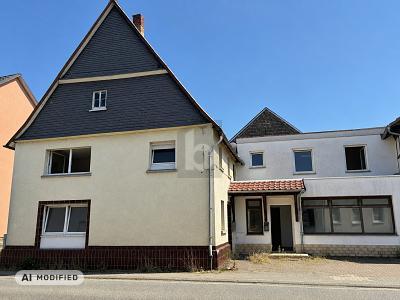 Foto - Mehrfamilienhaus, Wohnhaus mit 180,00 m&sup2; in Solms zum Kaufen