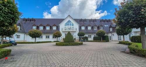 Gebäudeansicht - Terrasse mit Fairwayblick – Wohnen in erster Reihe am Golfplatz
