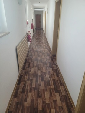 Flur zu den Zimmern - 