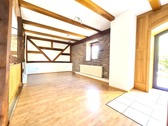 Wohnzimmer mit Ausgang Terrasse - 