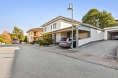 Ansicht mit Garage und Carport - Einfamilienhaus mit 170,00 m&sup2; in Thaleischweiler-Fröschen zum Kaufen