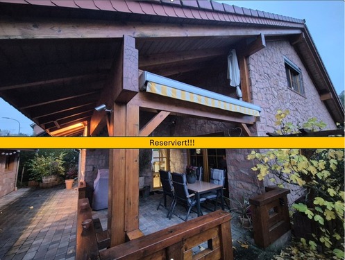 Eingangsbereich - Natürliche Eleganz: Sandstein trifft Holz – Wohnen mit Stil ideal für den 2 Personenhaushalt