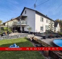 Großzügiges Wohnen für zwei Generationen: Poolbereich mit Poolbar und barrierefreiem EG - Katzweiler