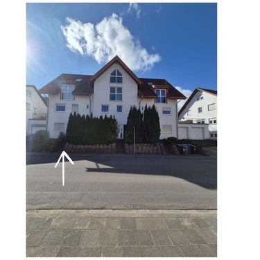 Hausansicht - Attraktives, vermietetes Reihenendhaus mit Garage und kleinem Grundstück – rentable Kapitalanlage