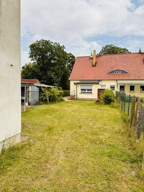 Frontansicht - Blick in Richtung - Rückseite der Immobilie - Gartenbereich - Doppelhaushälfte mit 113,22 m&sup2; in Wriezen zum Kaufen