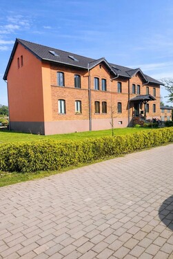 Frontansicht - saniertes MFH - Mehrfamilienhaus, Wohnhaus mit 856,72 m&sup2; in Briesen (Mark) zum Kaufen