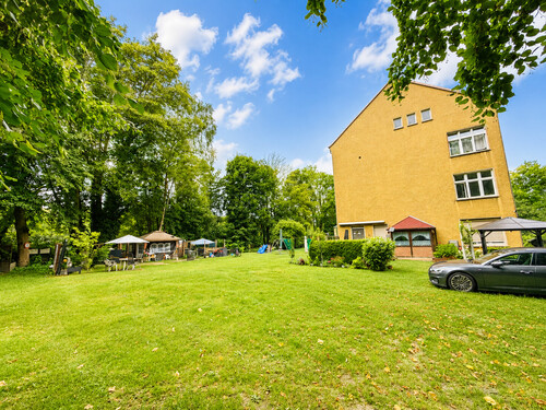 Gartenbereich - Seitenansicht MFH - 