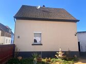 Hausansicht - 4 Zimmer Einfamilienhaus zum Kaufen in Rodgau