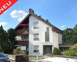 Attraktives Zweifamilienhaus mit Potenzial in bester Lage von Mühlheim!