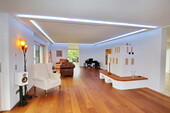 Wohnbereich mit Kachelofen - Villa mit 245,00 m² in Baden-Baden zum Kaufen