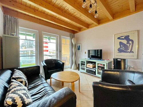Wohnzimmer - Ferienhaus mit 56,00 m² in Rheinsberg zum Kaufen