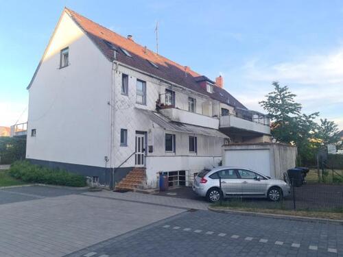 Seiten- und Rückansicht - 9 Zimmer Mehrfamilienhaus, Wohnhaus zum Kaufen in Homburg