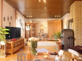 Wohnzimmer mit Kaminofen - 