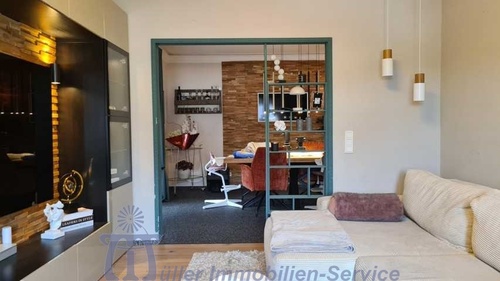 Foto 20_Wohnzimmer mit Blick zum Esszimmer - 