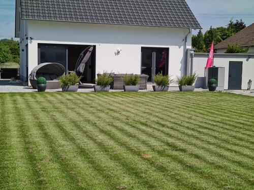 Foto 5_Rückansicht-Garten-Terrasse - 